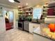Modern kitchen with stainless steel appliances, granite countertops, and ample storage space at 531 Hunter St, Lakeland, FL 33803