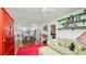 Comfortable living room leading to dining area and kitchen; features built-in bookshelves at 531 Hunter St, Lakeland, FL 33803