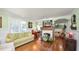 Inviting living room featuring hardwood floors and a fireplace at 531 Hunter St, Lakeland, FL 33803