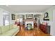 Cozy living room featuring hardwood floors, a decorative fireplace, and stylish decor at 531 Hunter St, Lakeland, FL 33803