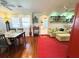 Inviting living room with hardwood floors, comfortable seating, and decorative shelving at 531 Hunter St, Lakeland, FL 33803