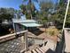View of the shed from the porch steps, blending into the tranquil outdoor space at 531 Hunter St, Lakeland, FL 33803