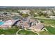 Aerial view of community center, pool, and golf course at 6127 Magpie Dr, Lakeland, FL 33809