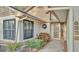 Inviting home entrance featuring a decorative glass door, brick walkway, and neatly trimmed bushes at 6228 Crane Dr, Lakeland, FL 33809