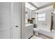 Clean bathroom with white cabinets and a shower/tub combo at 6235 Egret Dr, Lakeland, FL 33809