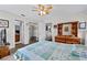 Spacious bedroom with mirrored wardrobe and wood flooring at 6235 Egret Dr, Lakeland, FL 33809