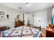 Comfortable bedroom with wood flooring and double door closet at 6235 Egret Dr, Lakeland, FL 33809