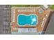 Overhead view of refreshing community pool with plenty of lounge chairs at 6235 Egret Dr, Lakeland, FL 33809