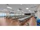 Large dining hall with numerous tables and chairs, ideal for events at 6235 Egret Dr, Lakeland, FL 33809