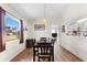 Charming dining room with hardwood floors and a view to the kitchen at 6235 Egret Dr, Lakeland, FL 33809