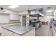 Large kitchen featuring stainless steel countertops and commercial-grade appliances at 6235 Egret Dr, Lakeland, FL 33809