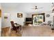 Living area with hardwood floors, sliding door to backyard, and comfortable seating at 6235 Egret Dr, Lakeland, FL 33809