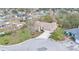 Expansive aerial view showcases the home's location in a peaceful residential neighborhood with mature trees at 6244 Napa Dr, Lakeland, FL 33813