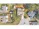 Overhead aerial view of the home in the neighborhood with fenced yards at 6244 Napa Dr, Lakeland, FL 33813