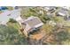 Aerial view showcasing the home's roof, yard, and surrounding neighborhood at 6244 Napa Dr, Lakeland, FL 33813