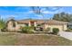 Charming single-story home boasts a well-manicured lawn and inviting curb appeal at 6244 Napa Dr, Lakeland, FL 33813