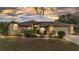 Beautiful home exterior with manicured landscaping, lawn lighting, and a well-maintained lawn at 6244 Napa Dr, Lakeland, FL 33813