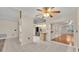 Open-concept kitchen featuring tile flooring, stainless steel appliances, and a light-colored cabinetry at 6244 Napa Dr, Lakeland, FL 33813