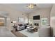 Inviting living room featuring a fireplace, modern decor, and neutral color palette at 6244 Napa Dr, Lakeland, FL 33813