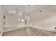 Open-concept floor plan with modern finishes and seamless flow to kitchen and dining area at 6244 Napa Dr, Lakeland, FL 33813