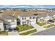 Two-story house with a two-car garage, located in a residential community with a playground nearby at 637 Griffon Ave, Lake Alfred, FL 33850