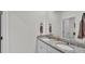 Bathroom with double vanity and granite countertop at 637 Griffon Ave, Lake Alfred, FL 33850