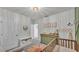 Bright Bedroom with a crib, dresser, and calming decor at 637 Griffon Ave, Lake Alfred, FL 33850