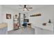Bright home office featuring built-in shelving and a large desk at 637 Griffon Ave, Lake Alfred, FL 33850