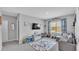 Playroom with toys, rug and small sofa for children at 637 Griffon Ave, Lake Alfred, FL 33850