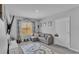 Playroom with large window, comfy couch, and playful decor at 637 Griffon Ave, Lake Alfred, FL 33850