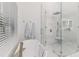 Primary bathroom features a soaking tub and glass enclosed shower with bench seating at 739 Swann Dr, Lakeland, FL 33809