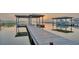 Dock and boat slip with boat at sunrise at 739 Swann Dr, Lakeland, FL 33809