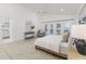 Bright and airy main bedroom with pool views, neutral tones, and plenty of natural light at 739 Swann Dr, Lakeland, FL 33809