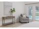 Main bedroom features a comfortable sitting area, with views to the pool, adding a touch of luxury and relaxation at 739 Swann Dr, Lakeland, FL 33809