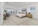 Serene main bedroom boasts a seating area, access to the pool area, and a light-filled ambiance at 739 Swann Dr, Lakeland, FL 33809