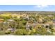 Home in a rural neighborhood with surrounding houses at 815 N Hendry Ave, Fort Meade, FL 33841