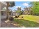 Large backyard with a shed and mature trees at 815 N Hendry Ave, Fort Meade, FL 33841