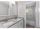 Bathroom with granite countertops and a tiled shower/tub combo at 815 N Hendry Ave, Fort Meade, FL 33841