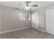 Bedroom featuring tile floors and double door closet at 815 N Hendry Ave, Fort Meade, FL 33841
