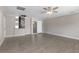 Living room featuring tile floors and ceiling fan at 815 N Hendry Ave, Fort Meade, FL 33841
