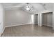 Main bedroom with vaulted ceiling, ceiling fan, and large closet at 815 N Hendry Ave, Fort Meade, FL 33841