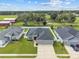 Aerial view showcasing a single-Gathering home with a two-car garage at 8218 Wilder Loop, Lakeland, FL 33809