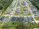 Aerial view of a residential neighborhood showing a single Gathering home at 8218 Wilder Loop, Lakeland, FL 33809