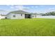 Spacious backyard with green grass at 8218 Wilder Loop, Lakeland, FL 33809