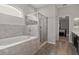 Spa-like bathroom with soaking tub and walk-in shower at 8218 Wilder Loop, Lakeland, FL 33809