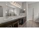 Elegant bathroom with double vanity and marble countertop at 8218 Wilder Loop, Lakeland, FL 33809