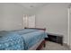 Bedroom with double bed and media console at 8218 Wilder Loop, Lakeland, FL 33809