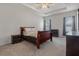 Comfortable bedroom with carpeted floor and ceiling fan at 8218 Wilder Loop, Lakeland, FL 33809