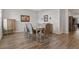 Light and airy dining room with wooden table and chairs at 8218 Wilder Loop, Lakeland, FL 33809
