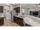 Modern kitchen with stainless steel appliances and marble countertops at 8218 Wilder Loop, Lakeland, FL 33809